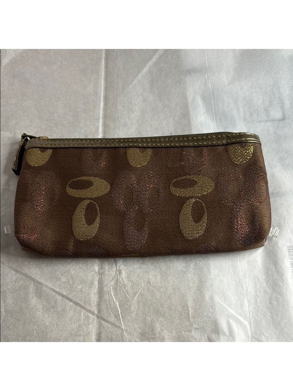 Brown and Gold Signatures Patterned Clutch